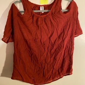 Rust color small with shoulder cut out